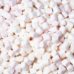 pink and white marshmallow background. Top view