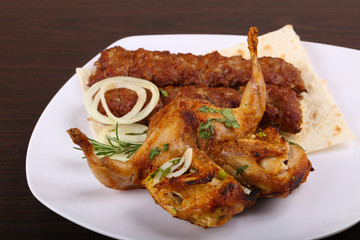 Beef kebab and grilled Quail