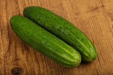 Two green cucumbers