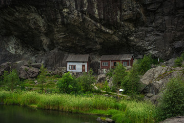 Small white, fishing house norway rock.