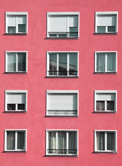 Modern light red housing block exterior