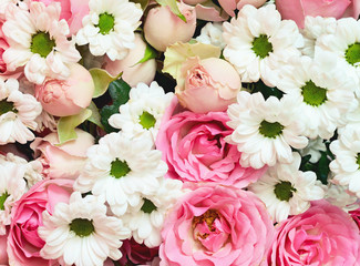 Pink roses and white daisy flowers bouquet