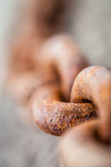 Color picture of a rusty metal chain, selective focus - 132402027