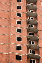 The construction of multi-storey houses of red brick