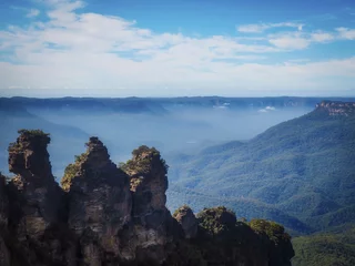 Foto auf Acrylglas Three Sisters Amazing nature of Three Sisters with mountain fog in Blue mountains, Australia