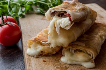 Turkish Pacanga Boregi with pastirma and cheddar (melted) cheese / pastirmali borek