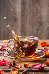 Cup on table with rose
