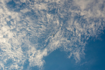 Blue sky with a plane on the sky