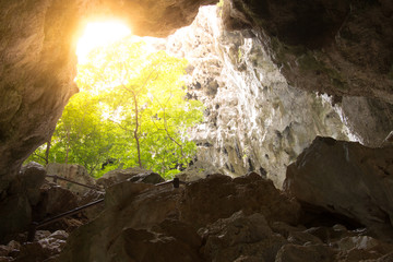 A glimmer of hope as rays of light stream into the cave from the