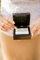 black box for wedding rings with the newlyweds