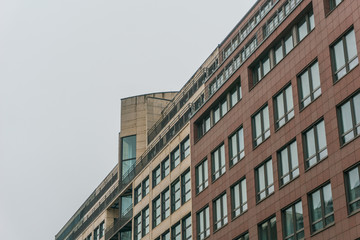 typical office buildings in a row on foggy day