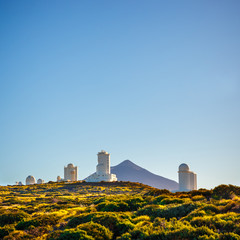 Telescopes of the Astronomical Observatory Izana with Volcano El Teide in the background, Spain