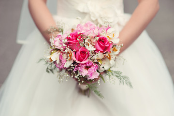 Bride holding her wedding bouquet