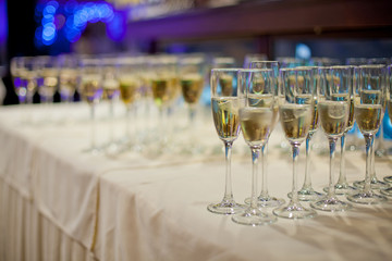 glasses of champagne in restaurant close up background