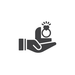 Hand holding engagement ring icon vector, filled flat sign, solid pictogram isolated on white. Symbol, logo illustration