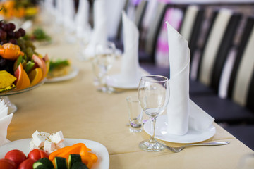 Banquet wedding table setting on evening reception