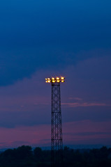 Big reflector pole over an industrial facility by night, Belgrade, Serbia