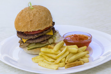 Tasty and appetizing hamburger cheeseburger