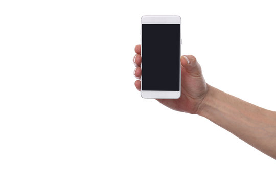 Male hand holding mobile, cellular phone with empty screen isolated on white background. Copy paste image or text.