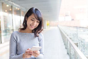 Woman use of mobile phone