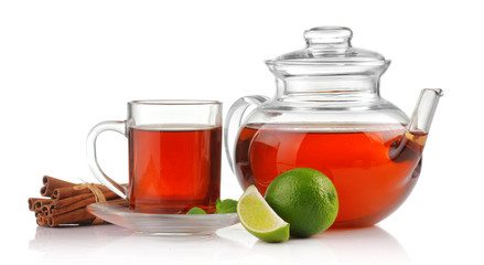 Tea cup, teapot with fresh mint, lime and cinnamon isolated