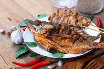 Deliciousfood with fish fried and roasted pork