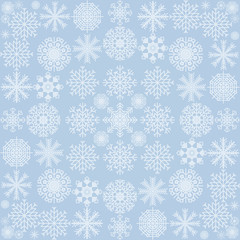 The pattern of snowflakes on a blue background. Vector illustration.