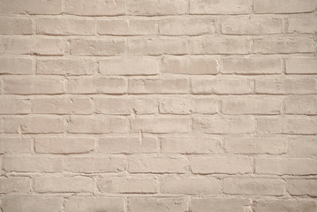 Fototapeta premium Beige grunge brick wall texture background