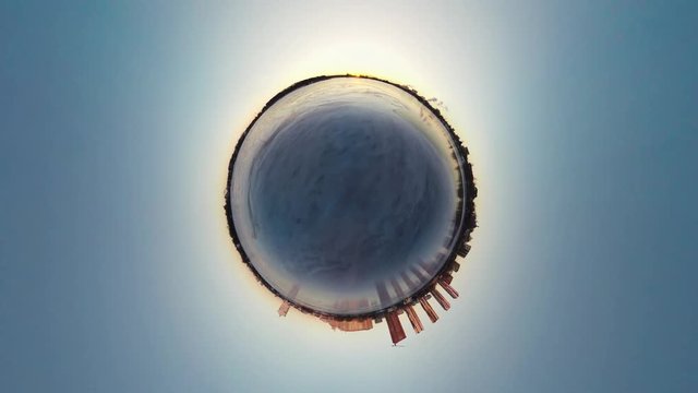 Sunset Over Frozen Ice. Rolling Tiny Little Planet 360