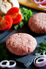 Burger Patties With Tomatoes And Onions