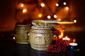 Bowl with kutia - traditional Christmas sweet meal in Ukraine, Belarus and Poland, on wooden table, bright background