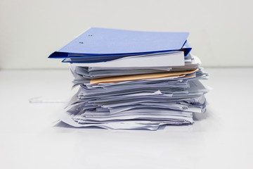 Stack of business report paper file   