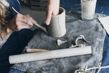 Small business concept, woman working in ceramic workshop