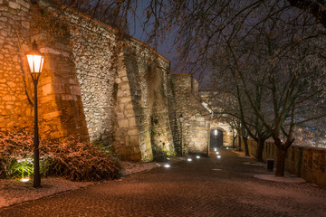 Fototapeta na wymiar Sigismund Gate on a winter night, main entrance to Bratislava Castle hill