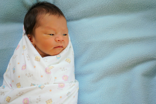 New Born,under One Month Asian Baby In Swaddling Cloth