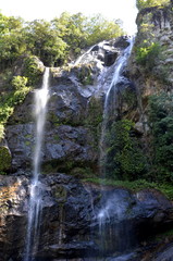 Obraz premium Waterfall in deep forest on the mountain.