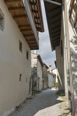Narrow medieval street in Smartno village, Slovenia.