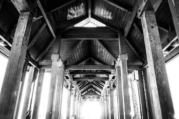 Black and White Photograph of Wooden Ceiling 