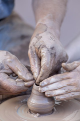 Pottery making, close up on hands