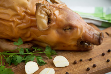 Pig close-up on a wooden board in a rustic style