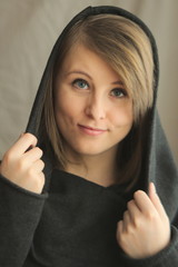 Beautiful young woman in the hood