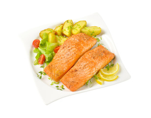 dish of salmon fillets with roasted potatoes
