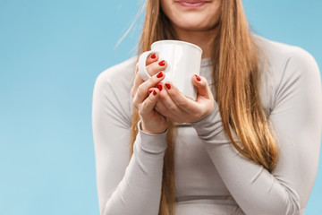 Fototapeta na wymiar girl in thermal underwear drinking tea