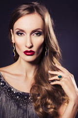 Fototapeta premium Brunette beautiful luxury woman in dress with clear skin and eve