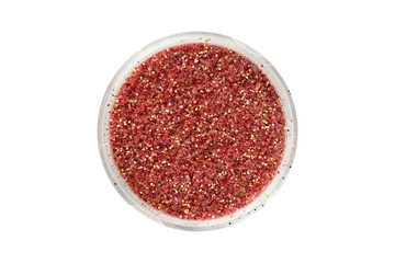 Obraz na płótnie Canvas Brown red glitter particles in open container, view from above. Can be used for decorating nails or makeup. Beauty product isolated on white background, with clipping path