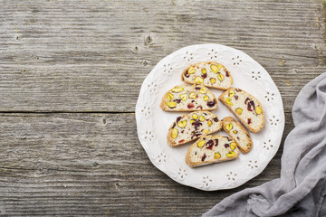 Crispy traditional delicious Italian biscotti cookies or kantuchchi with pistachios and dried...