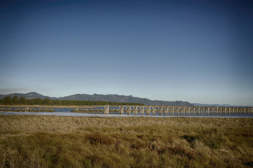 Obraz premium distant view of Mt. St. Helens from Fort Stevens State Park along the Columbia river in Warrenton Oregon 