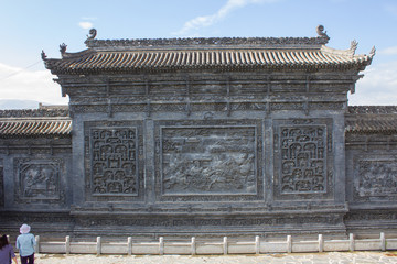 Tempel wall with reliefs, Tibet, PR China