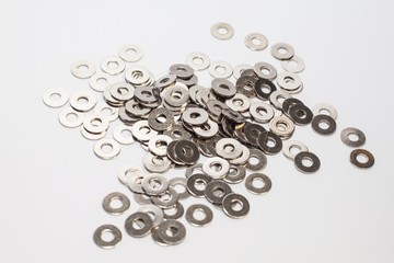 Used old washers and spring washers with isolated white background for commercial