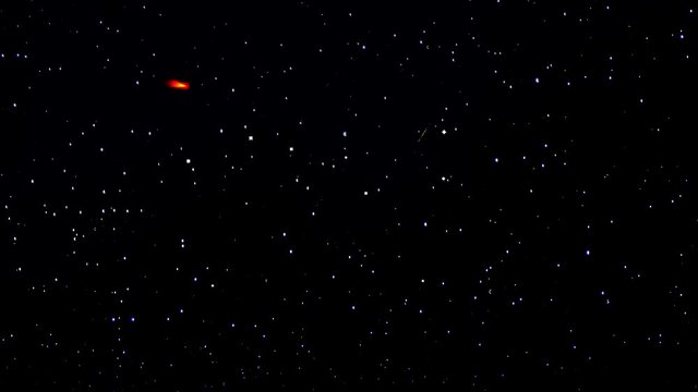 Comet. Explosion in the space. Celestial body, asteroid, comet in the cosmos